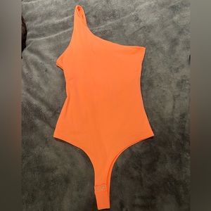 Orange/pink one shoulder bodysuit